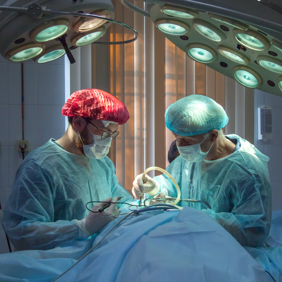 ENT surgeons performing a procedure in the operating room